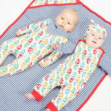 Load image into Gallery viewer, Baby in rainbow fox sleepsuit