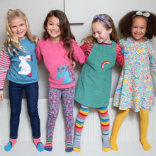 Load image into Gallery viewer, Girl in rainbow pinafore