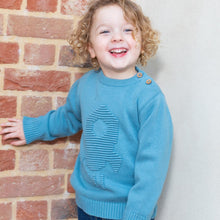 Load image into Gallery viewer, Boy in rocket jumper