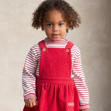 Load image into Gallery viewer, Girl in stripy heart jumper